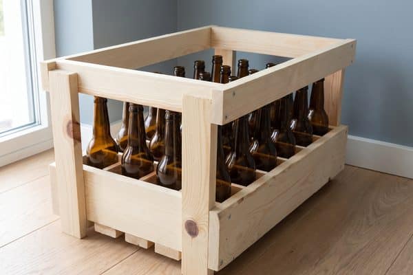 Casier à bière en bois 24 × 33 cl pour bouteilles long neck, rempli