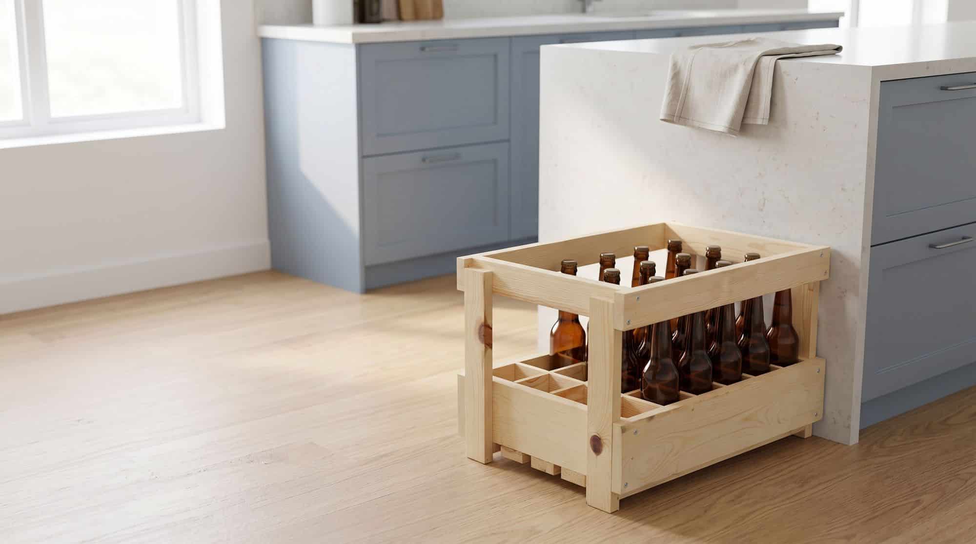 Casier à bière en bois de 24 cases à moitié rempli, au pied d'un îlot de cuisine bleu-gris